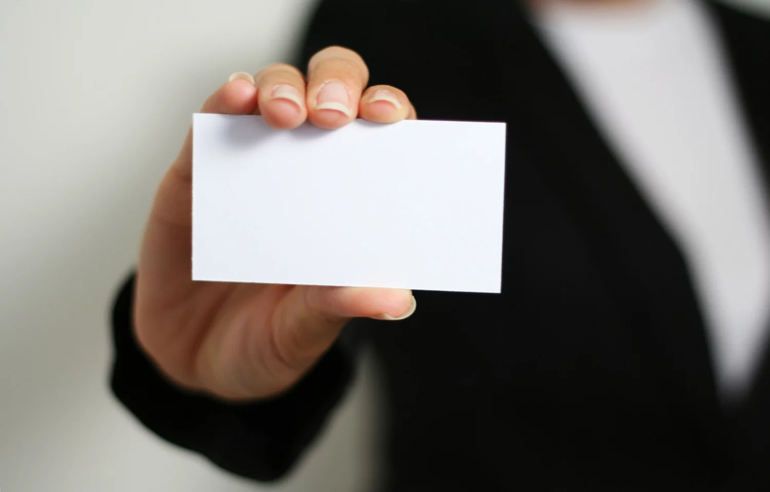 Man showing a white card